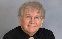Photo of Dr. Raymond Erickson. Link to his story.