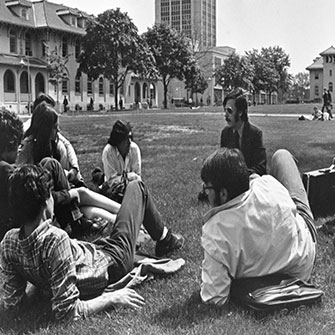Photo of students on campus lawn.